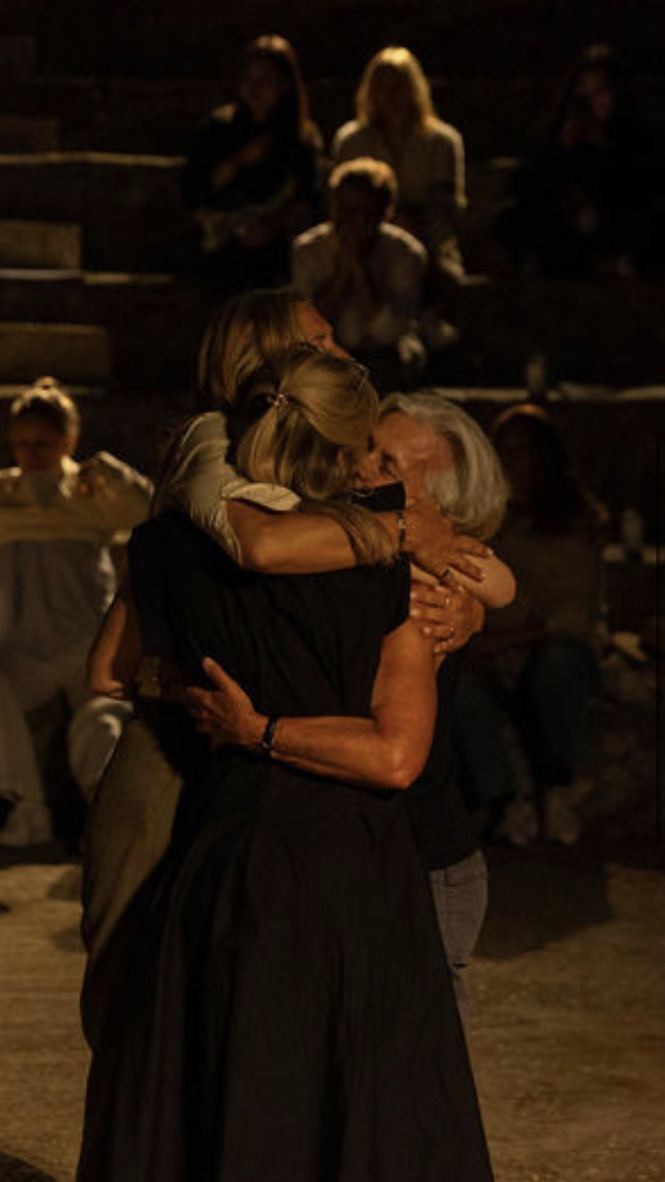 An embrace in the night amphitheatre