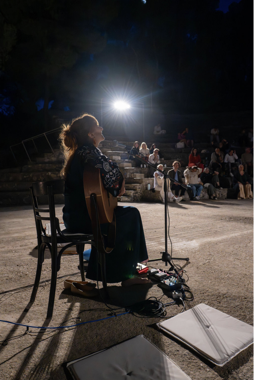 Live music in the night amphitheatre — guitar and voice